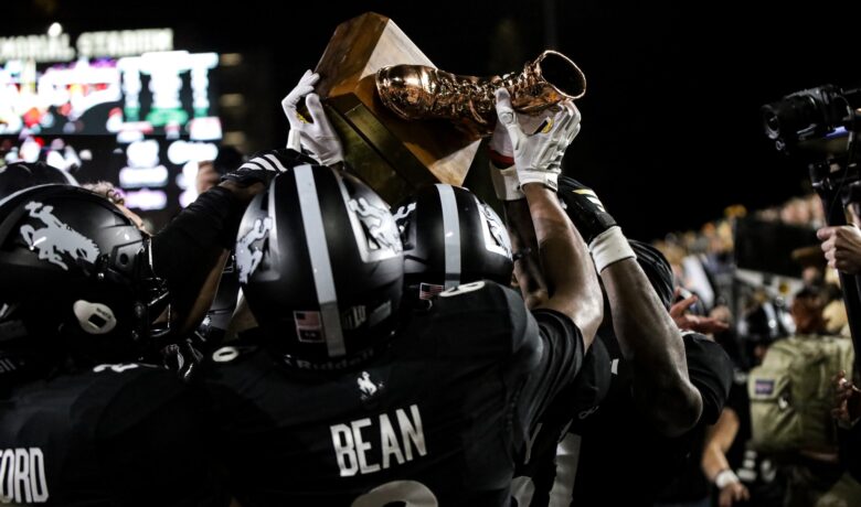 Cowboys Blank Rams 28-0 in 117th Border War